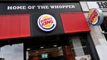 A Burger King restaurant exterior with the Home of the Whopper sign July 2026