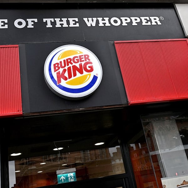A Burger King restaurant exterior with the Home of the Whopper sign July 2026