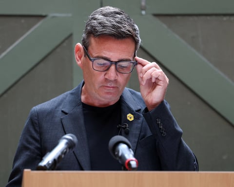 Andy Burnham speaks at a podium as UK incoming prime minister apologises for Labour Gaza response