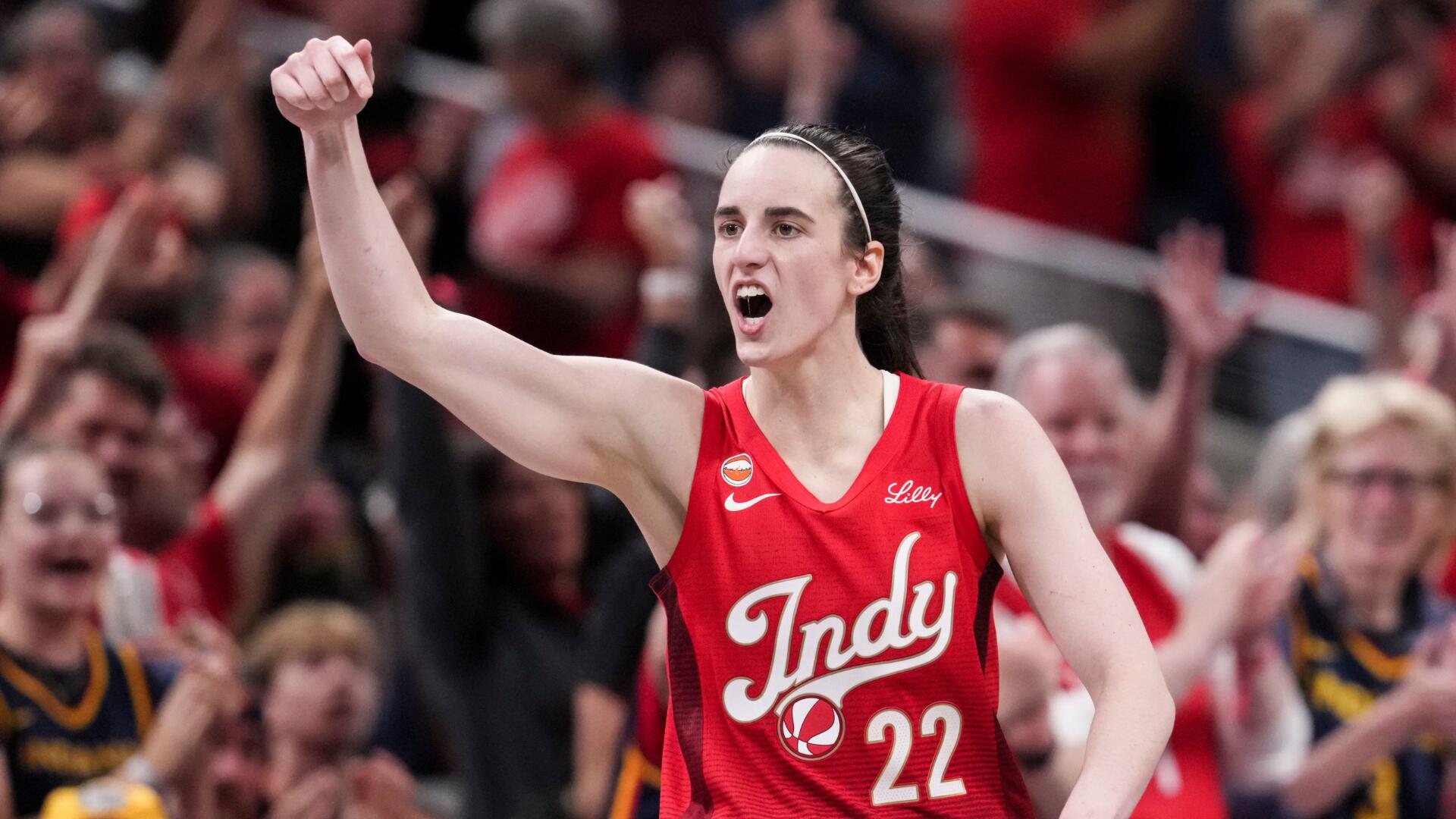 Caitlin Clark celebrates after scoring 45 points and 10 assists for the Indiana Fever