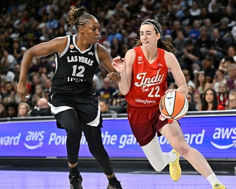 Caitlin Clark dribbling for Indiana Fever setting WNBA assist record