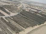 Aerial view of US military logistics storage facilities at Camp Arifjan in Kuwait, a key American supply hub targeted in IRGC retaliation strikes