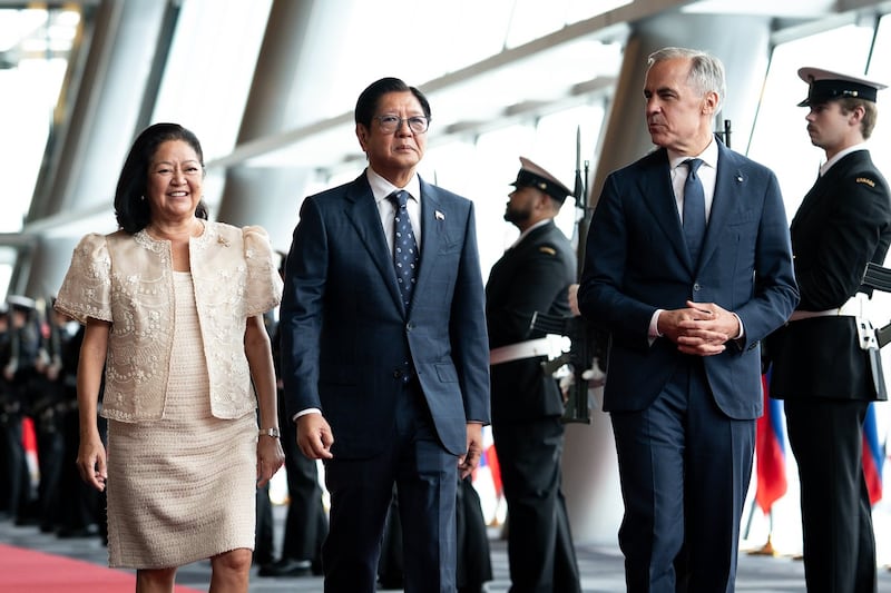 Prime Minister Mark Carney walks with Philippine President Ferdinand Marcos Jr. and First Lady Louise Araneta-Marcos before their bilateral meeting in Vancouver