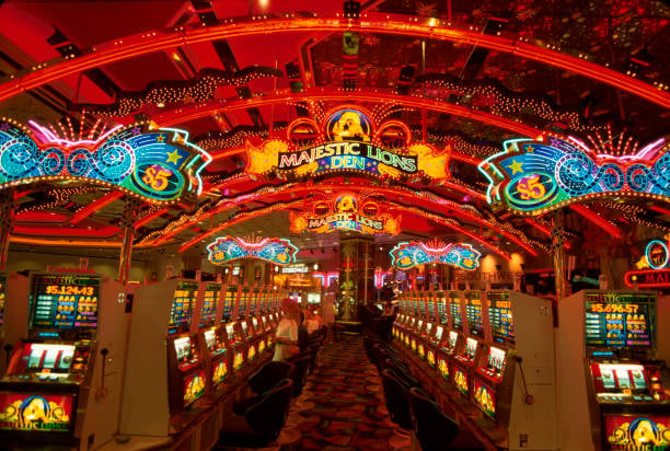Casino gaming floor with rows of slot machines inside a US casino resort