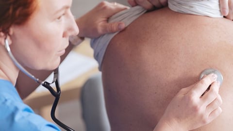 Doctor examining a patient for Legionnaires disease symptoms