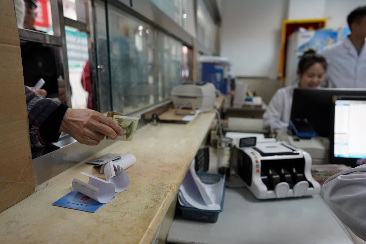 Older adults queuing for registration at a community health centre in China