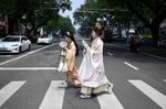 Members of an ethnic minority group in China's Xinjiang region, where Beijing's new ethnic unity law mandates Mandarin as the sole language of instruction from kindergarten