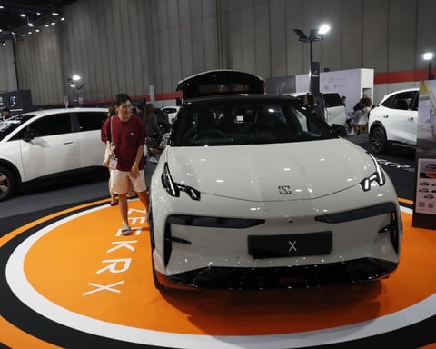 Chinese electric vehicles from Leapmotor and Zeekr at a showroom as the brands set consecutive monthly delivery records in June 2026