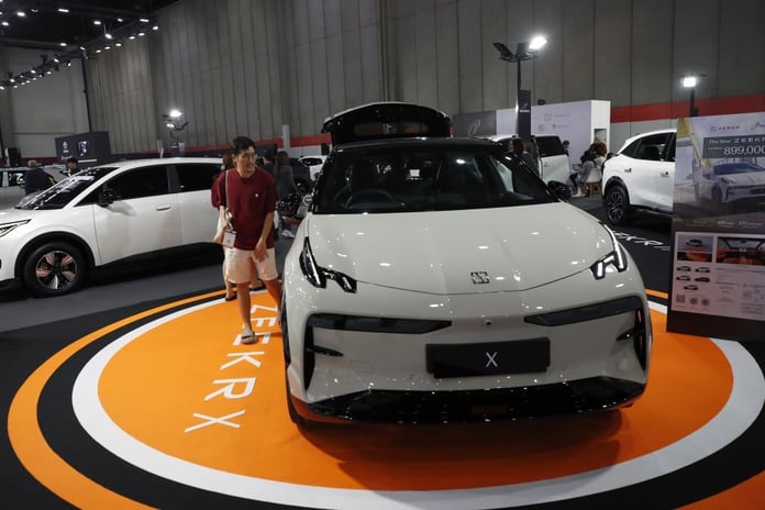 Chinese electric vehicles from Leapmotor and Zeekr at a showroom as the brands set consecutive monthly delivery records in June 2026