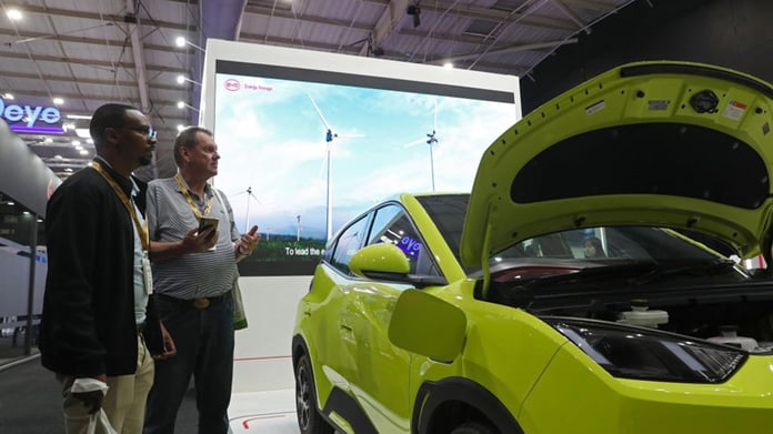 Chinese electric vehicles on an assembly line. EY-Parthenon estimates $23.6 trillion to reduce US-Europe dependence on Chinese supply chains.