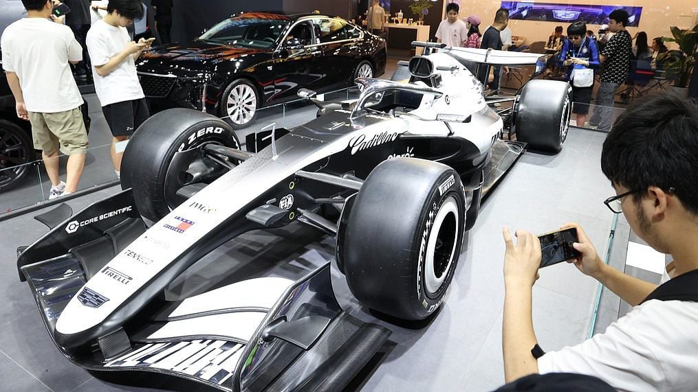 Visitors browse Chinese smart connected vehicles at 2026 Chongqing International Auto Exhibition