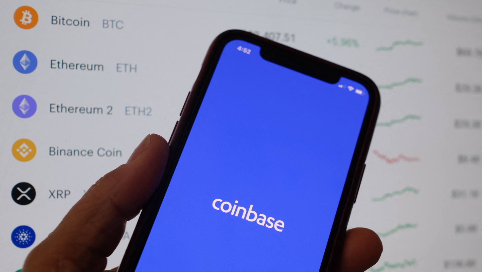 Coinbase app on smartphone as Binance and Coinbase pursue identical crypto super app vision