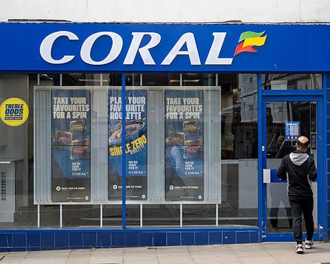 Coral betting shop storefront in Swansea city centre high street, Wales, United Kingdom