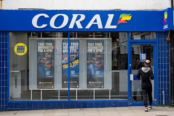 Coral betting shop storefront in Swansea city centre high street, Wales, United Kingdom