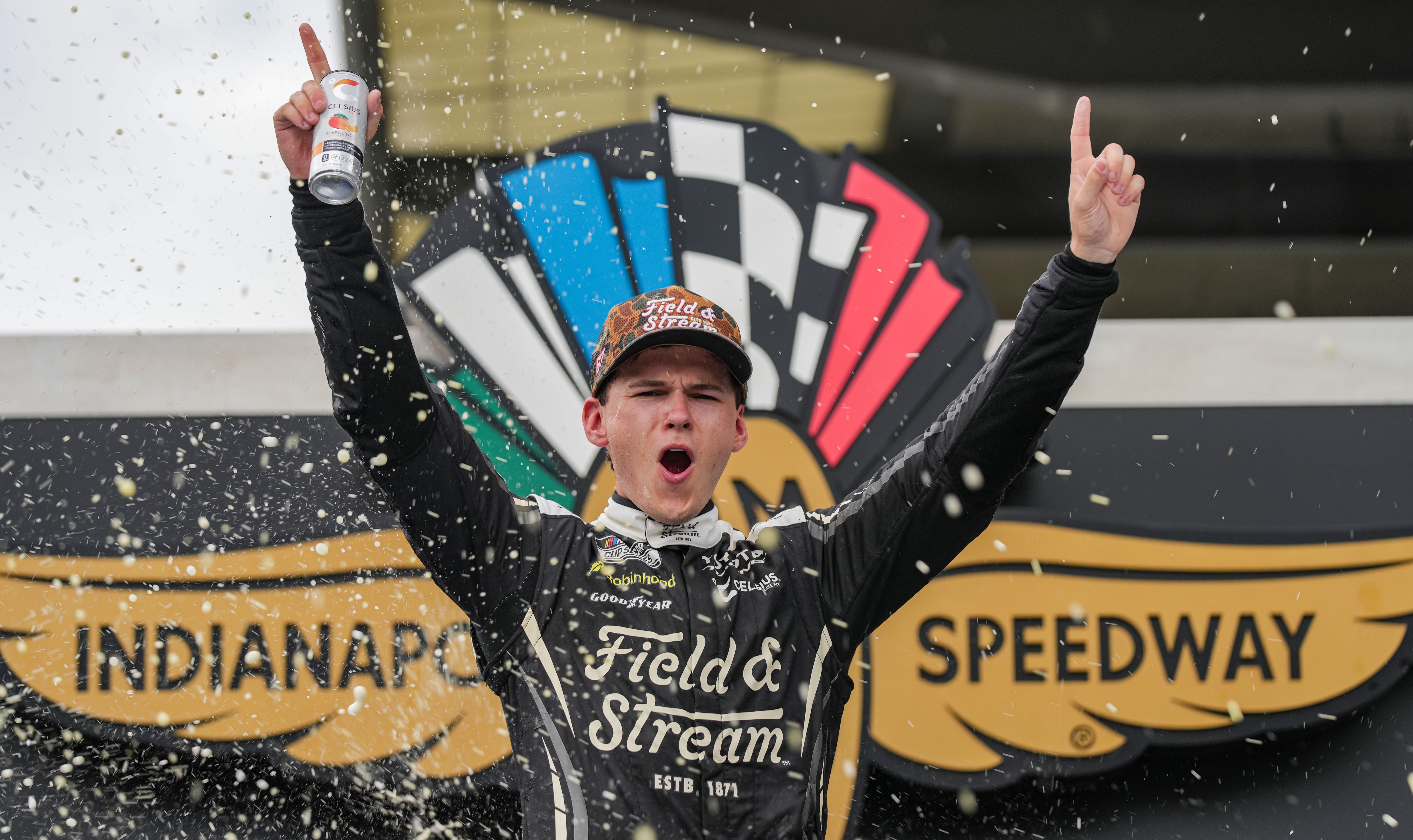 Corey Heim celebrates in victory lane after winning the NASCAR Cup Series Brickyard 400 at Indianapolis Motor Speedway on July 26 2026