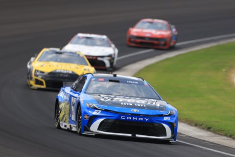 Corey Heim driving No. 67 Field and Stream Toyota leads the field at Indianapolis Motor Speedway during the 2026 Brickyard 400