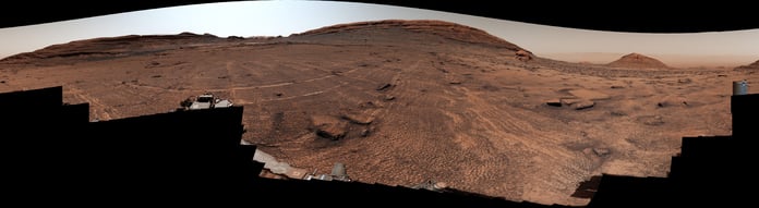 NASA Curiosity rover panorama showing vast field of honeycomb-like polygon fractures in Valle Grande region of Mars