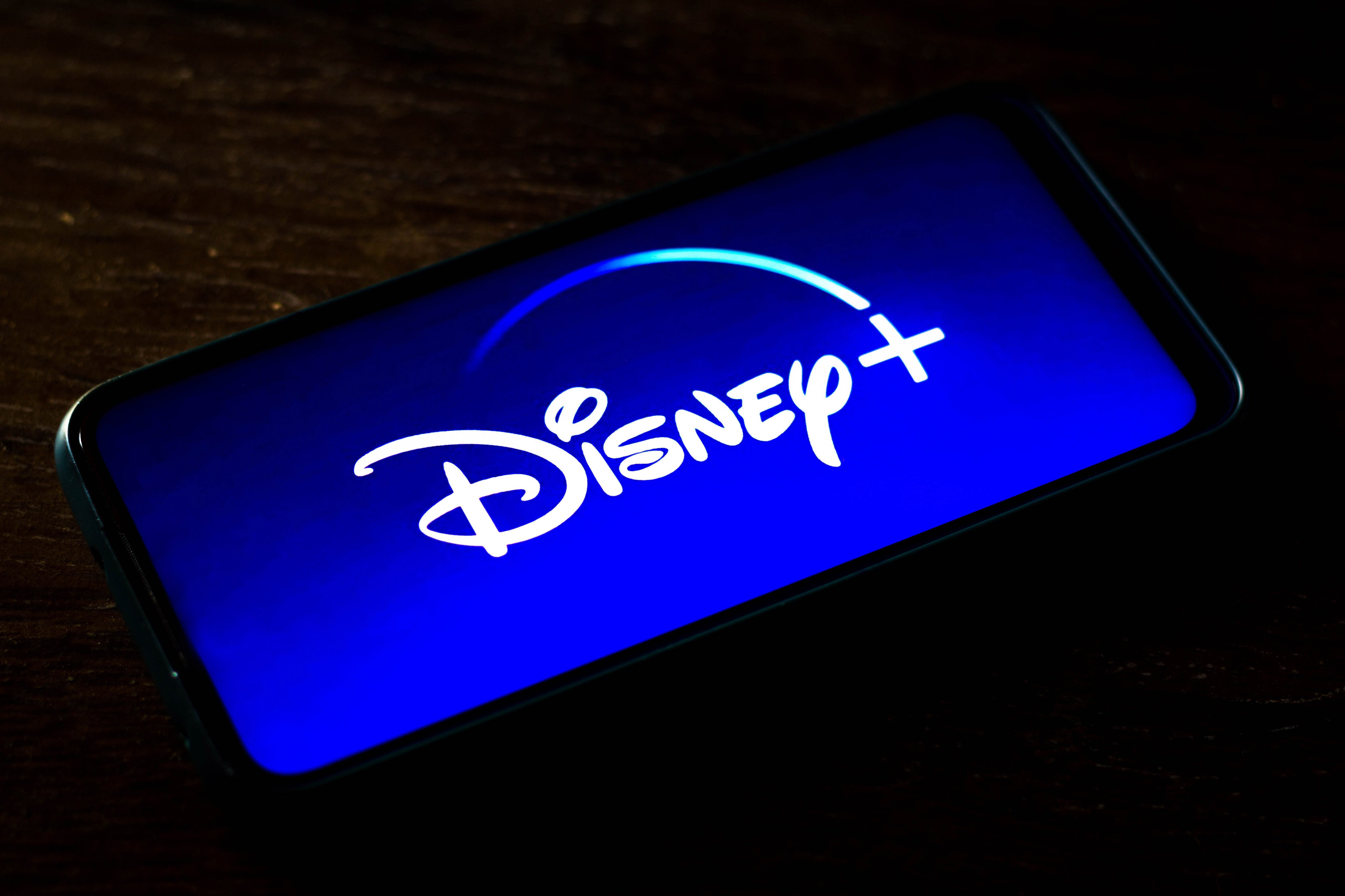 Disney Plus app displayed on a smartphone as streaming services compete for live TV audiences