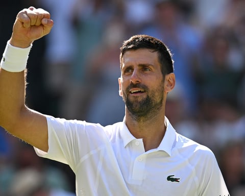 Novak Djokovic celebrates breaking Roger Federer's record for most Wimbledon singles wins in 2026