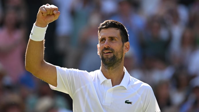 Novak Djokovic celebrates breaking Roger Federer's record for most Wimbledon singles wins in 2026