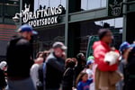 DraftKings Sportsbook signage outside Wrigley Field in Chicago before a Cubs game