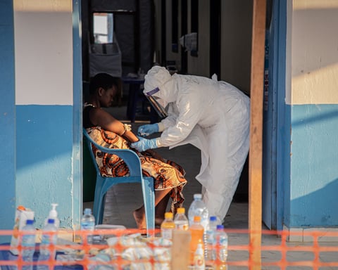 Health workers in protective gear respond to the Ebola outbreak in Ituri province, Democratic Republic of Congo