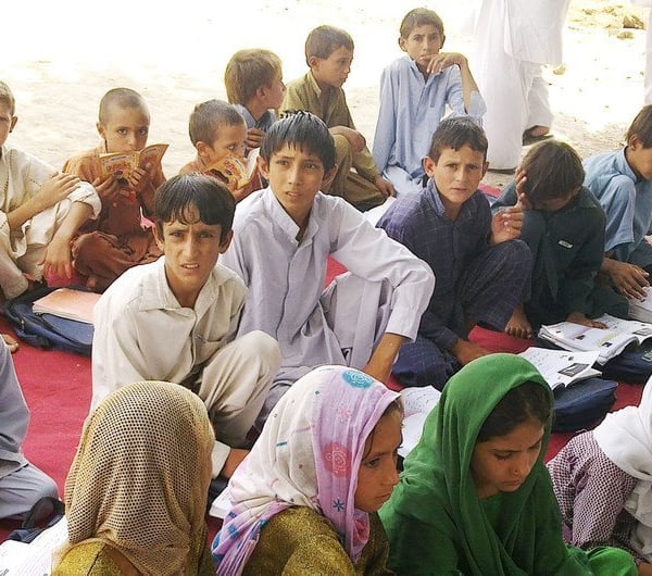 Students attend class in Afghanistan, where years of political conflict have disrupted access to education for millions of children
