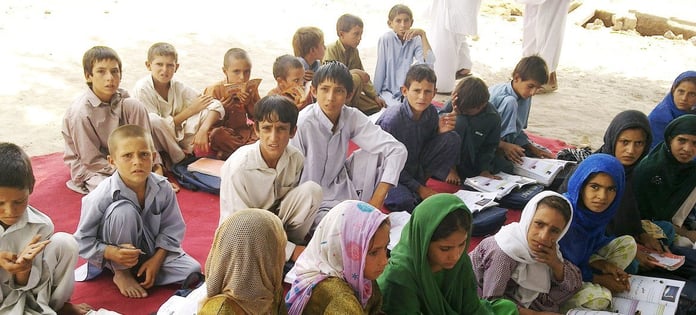Students attend class in Afghanistan, where years of political conflict have disrupted access to education for millions of children