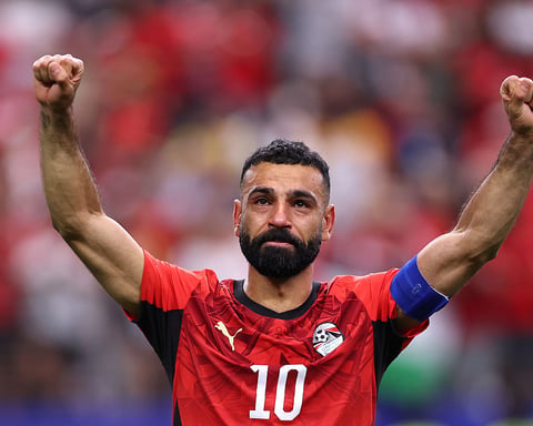 Mohamed Salah of Egypt celebrates after scoring his Panenka penalty in the World Cup round of 32 against Australia at AT&T Stadium in Dallas