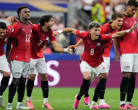 Egypt players celebrate after defeating Australia 4-2 on penalties in the 2026 FIFA World Cup Round of 32 in Arlington Texas