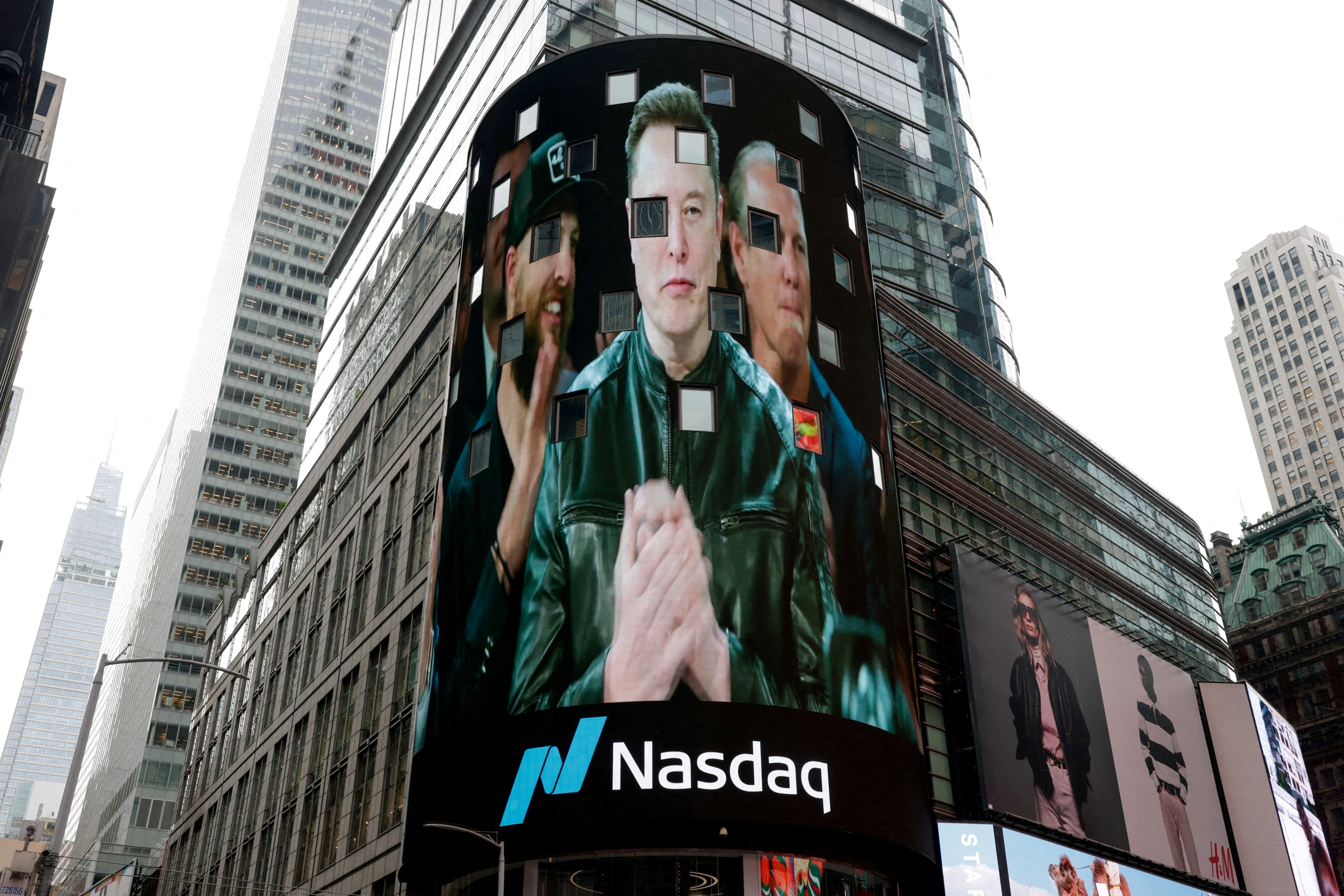 Elon Musk at Nasdaq MarketSite on SpaceX IPO day as Tesla reports Q2 2026 earnings miss and record deliveries