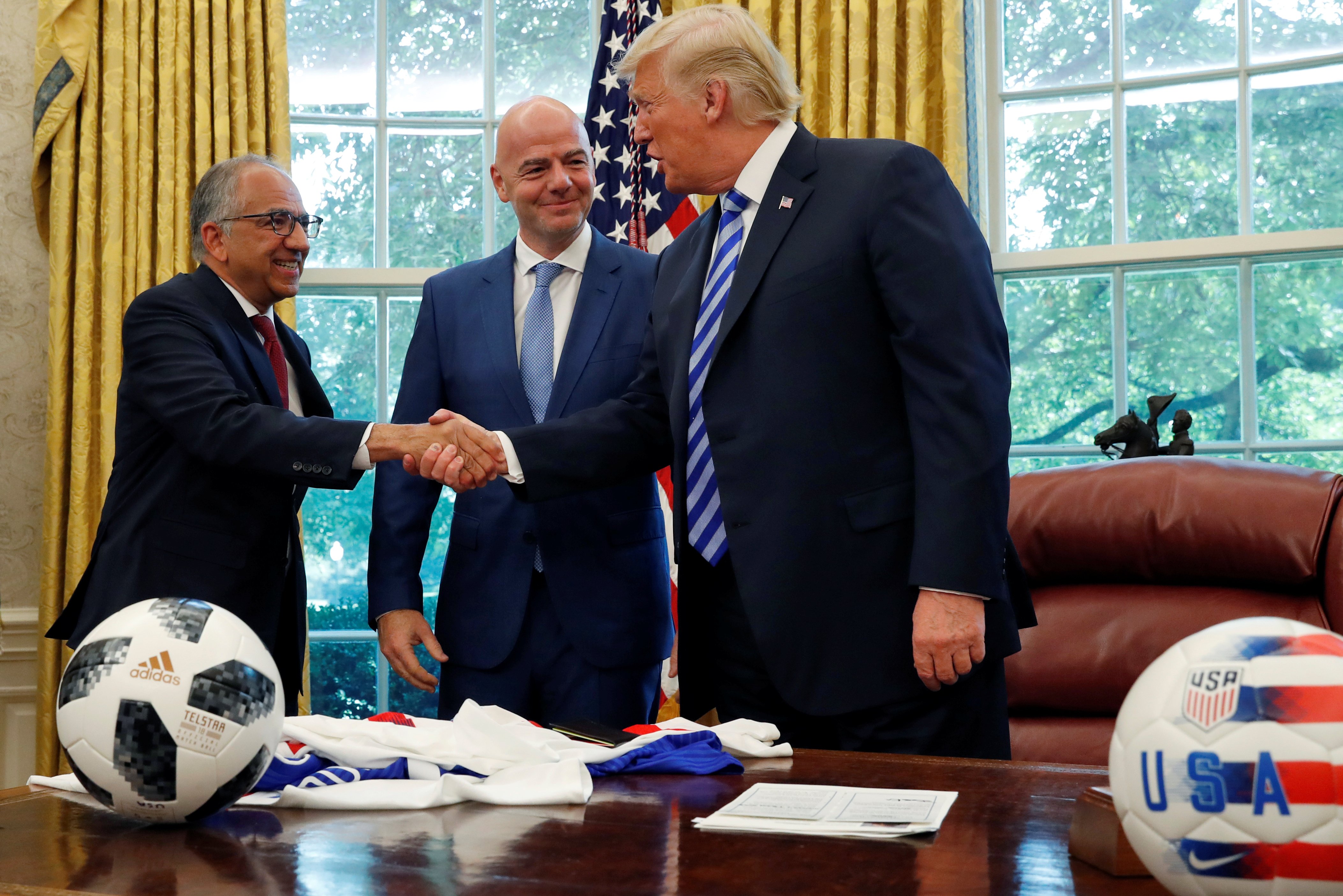 Carlos Cordeiro shakes hands with Trump at Gianni Infantino FIFA meeting in 2018