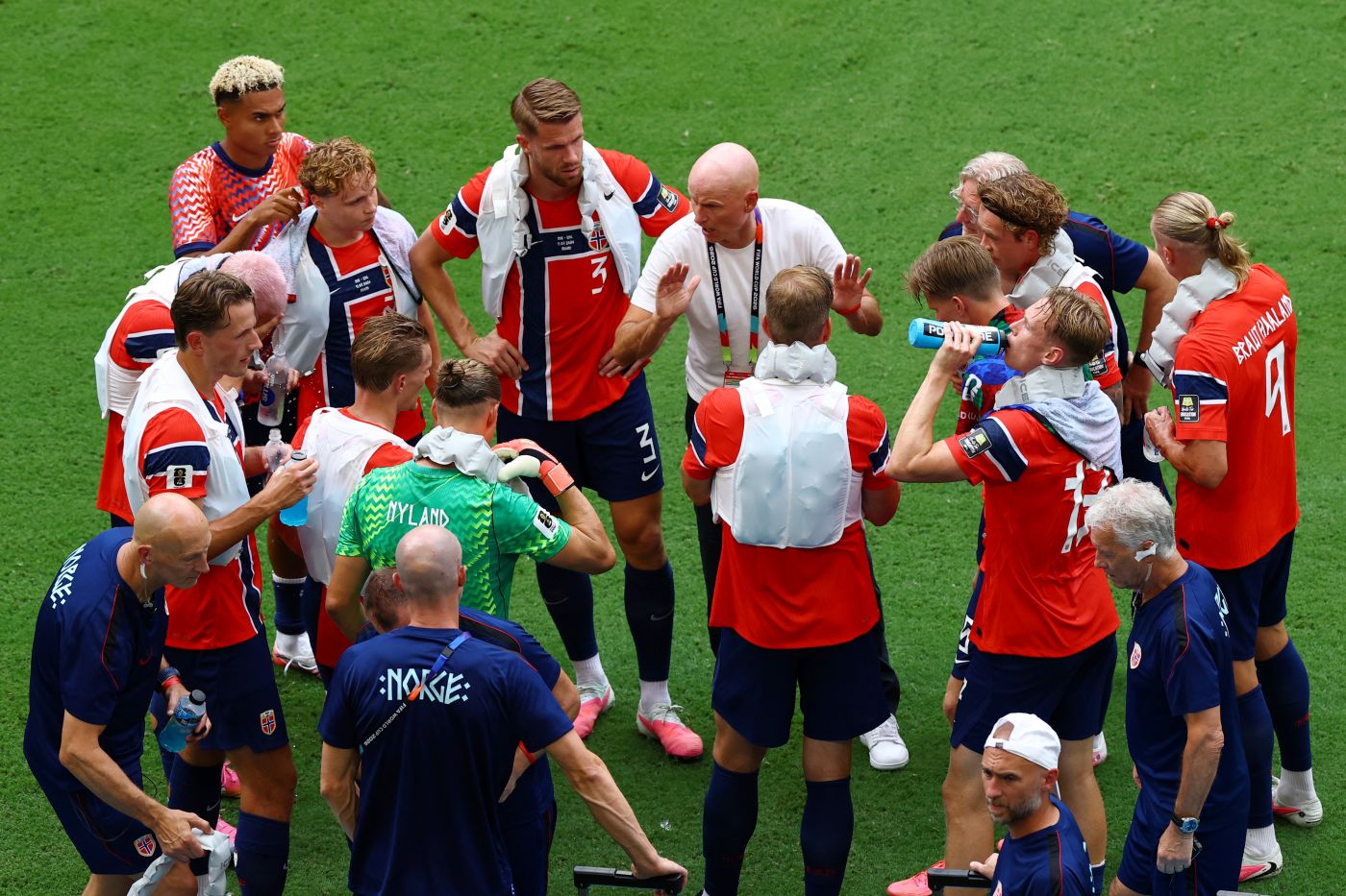 Players during a mandatory hydration break at the FIFA World Cup 2026, the first major tournament to enforce the new cooling break rules