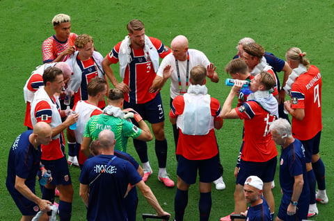 Players during a mandatory hydration break at the FIFA World Cup 2026, the first major tournament to enforce the new cooling break rules