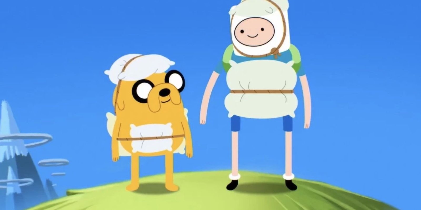 Finn the Human and Jake the Dog resting on pillows in a scene from Adventure Time: Side Quests Season 1
