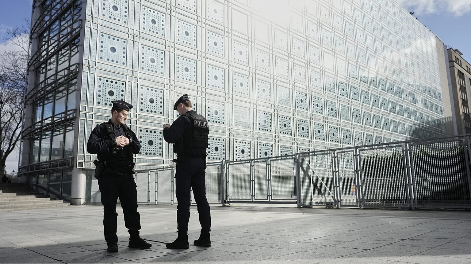 French police outside Arab World Institute Paris during Epstein network investigation February 2026