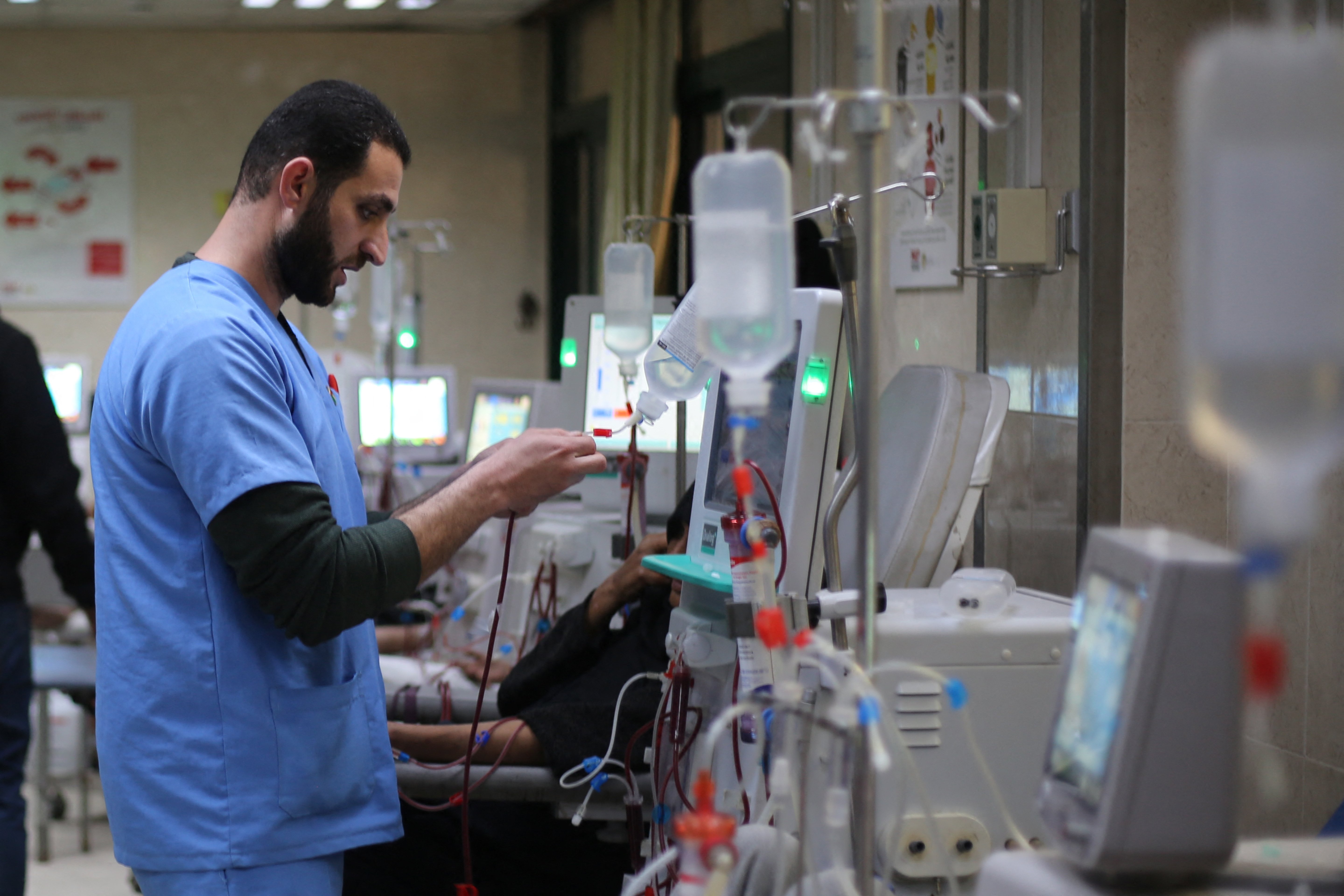 Dialysis patients at Al-Aqsa Martyrs Hospital in Gaza receiving treatment under emergency power during Israel's siege