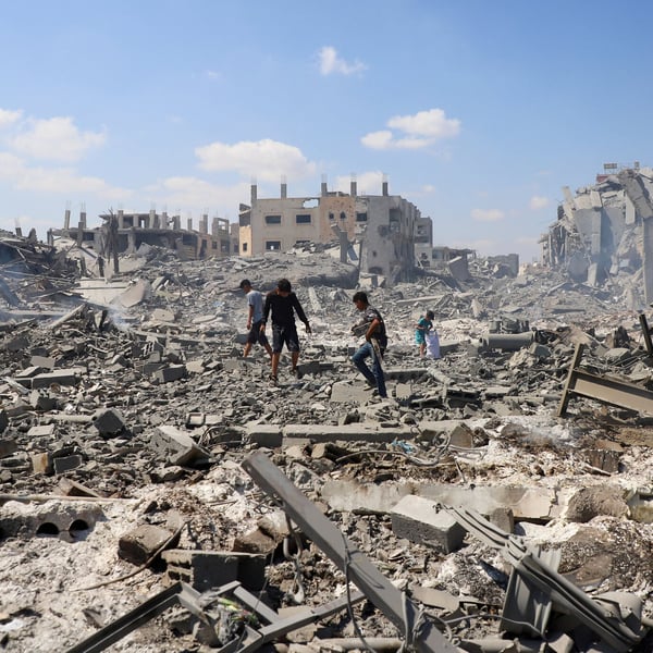 Palestinians inspect site of Israeli strike on storage facility Gaza City July 27 2026