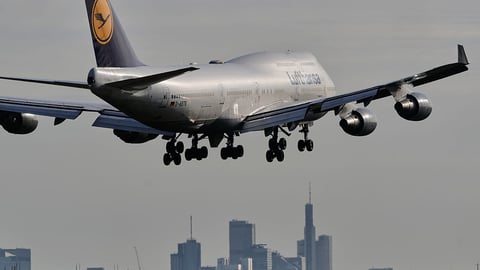 Lufthansa plane at Frankfurt Airport representing Germany emigration trends