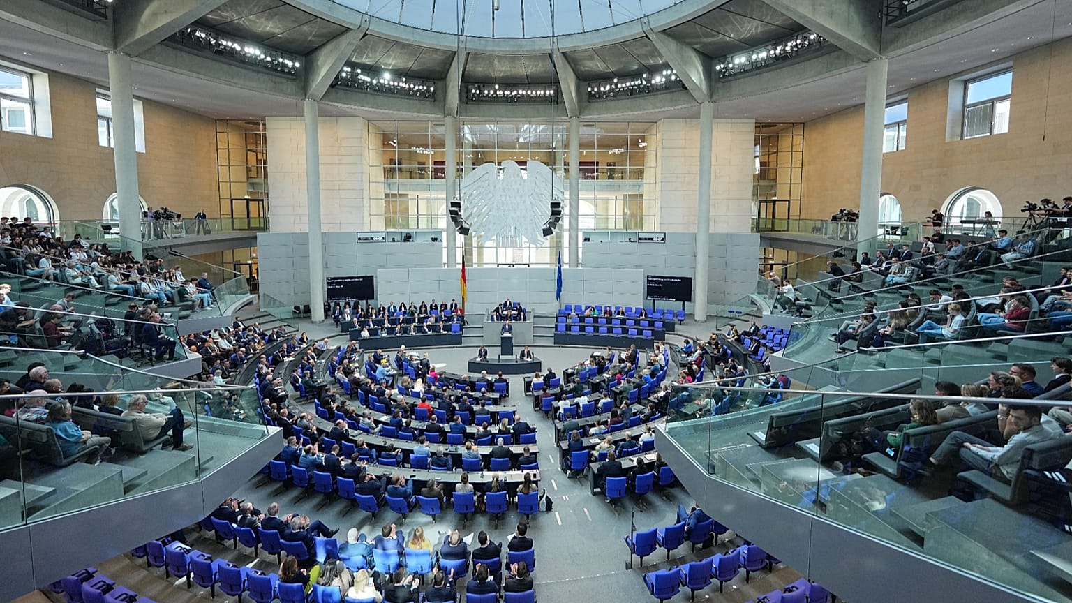 Friedrich Merz speaking at the Bundestag during Germany coalition economic reform package presentation 2026