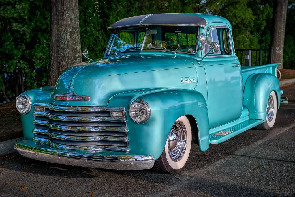 Chevrolet truck on the road representing General Motors North American vehicle sales