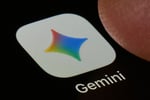 Google Gemini AI app displayed on a smartphone against a colorful background