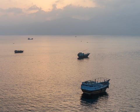 Aerial view of boats anchored off Musandam peninsula near the Strait of Hormuz, June 27 2026