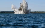 Naval mine explodes in water during minesweeping exercise, Strait of Hormuz mine clearance 2026