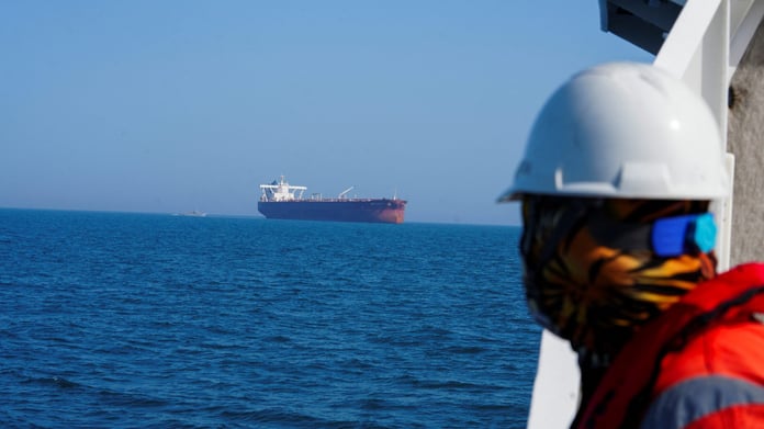 Oil tanker navigating through the Strait of Hormuz amid Iran sanctions dispute