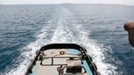 Houthi fighters with weapons in Yemen amid maritime blockade declaration against Saudi Arabia