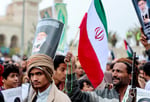Houthi supporter at Sanaa rally as Yemen conflict escalates in 2026