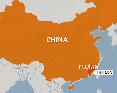 Smoke billows from the Huiteng Shoes factory fire in Jinjiang, Fujian province, China