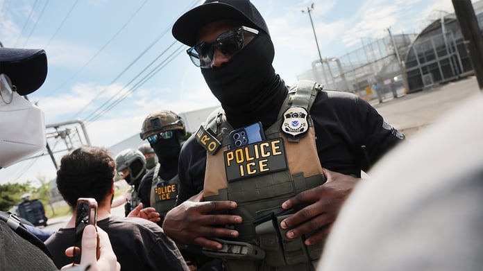 ICE agent outside immigration detention facility in Texas as Democrats demand Dilley closure