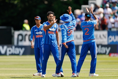 India cricket team players celebrate during the T20I series against England at Old Trafford Manchester